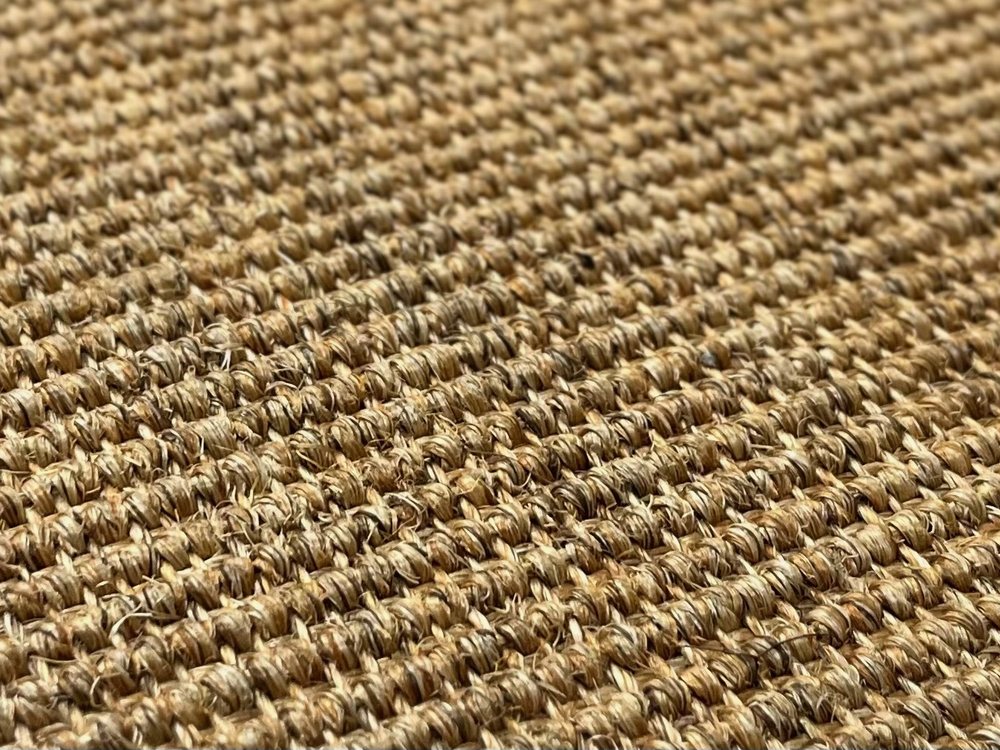 Close texture of a gold commercial carpet tile